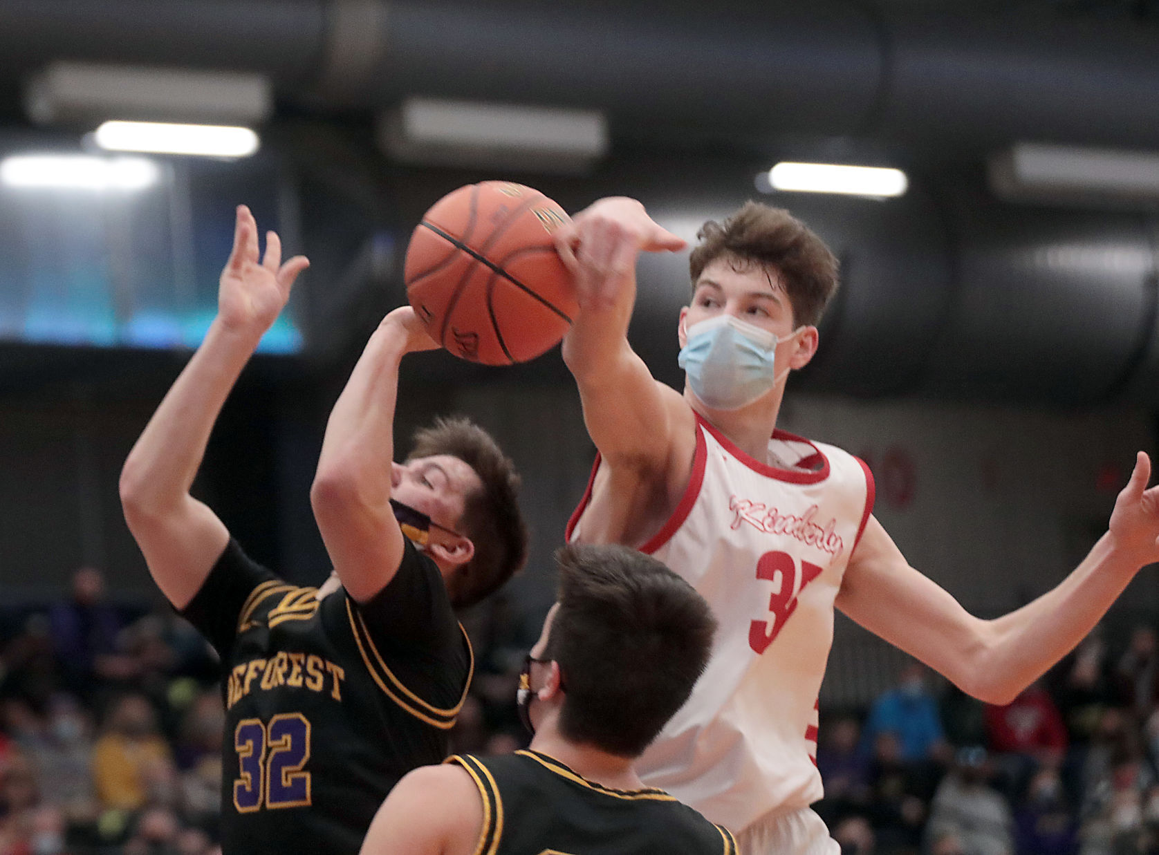 WIAA state boys basketball photo: Kimberly's Grant Asman, DeForest's Brody Hartig